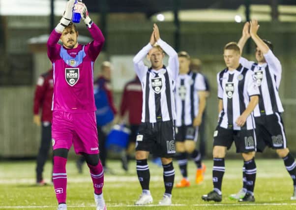 St Mirren goalkeeper Jamie Langfield, making his debut after his move from Aberdeen, applauds the fans at full-time. Picture: Roddy Scott/SNS