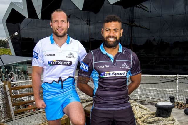 James Eddie, left, and Junior Bulumakau launch Glasgow Warriors new home and away kit for the forthcoming season. Picture: SNS