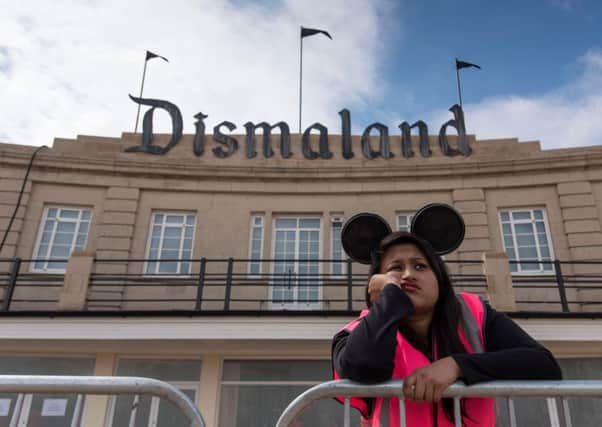 A steward is seen outside Bansky's 'Dismaland' exhibition, which opens tomorrow. Picture: Getty Images