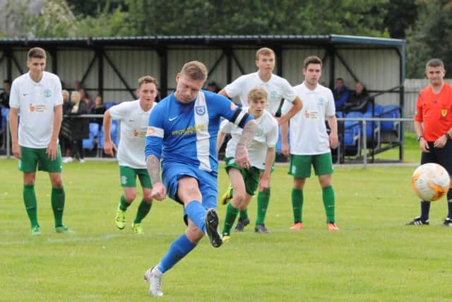 Garry O'Connor scores a penalty kick, in a pre-season friendly against Hibs. Picture: Grant Kinghorn