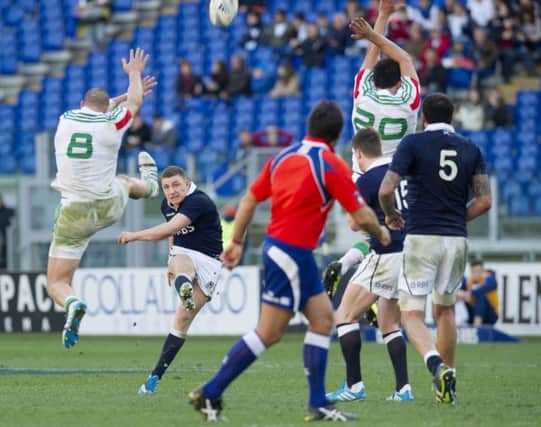 Duncan Weir converts a drop goal in the dying minutes of the 2014 Six Nations game against Italy to clinch a 21-20 win. Picture: SNS/SRU