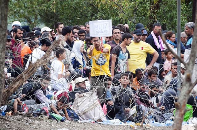 Syrian refugees mass at the Macedonian-Greek border. Picture: Getty