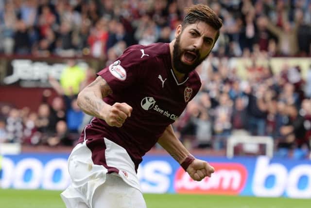Juanma Delgado celebrates after making it 3-0 to Hearts. Picture: SNS