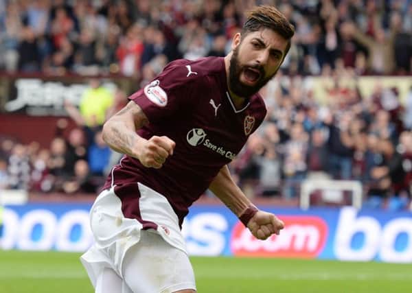 Juanma Delgado celebrates after making it 3-0 to Hearts. Picture: SNS