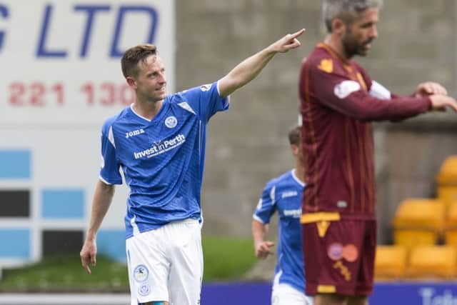 Steven MacLean celebrates after netting his second goal of the game to give St Johnstone a 2-1 lead. Picture: SNS