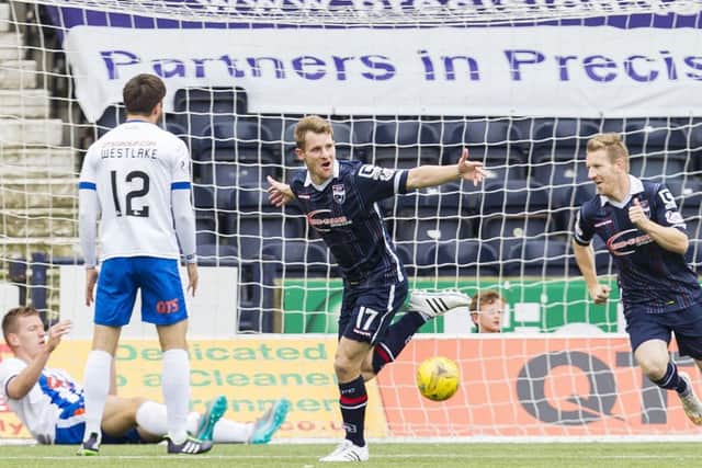 Ross County's Jonathan Frank (centre) celebrates the second goal for his side. Picture: SNS