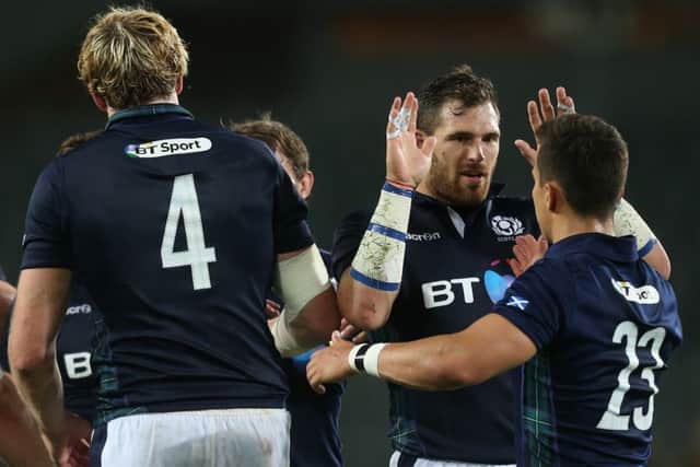 Sean Lamont celebrates with Damien Hoyland. Picture: Getty