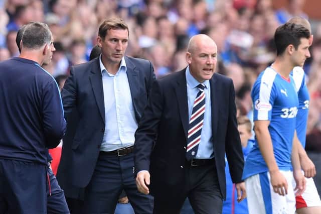 Hibernian manager Alan Stubbs (centre) and Rangers manager Mark Warburton. Picture: SNS