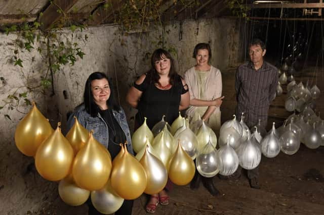 Kim Canale, Juliana Capes, Gayle Nelson and Alan Bond with the Meltwater installation. Picture: Andy Thompson
