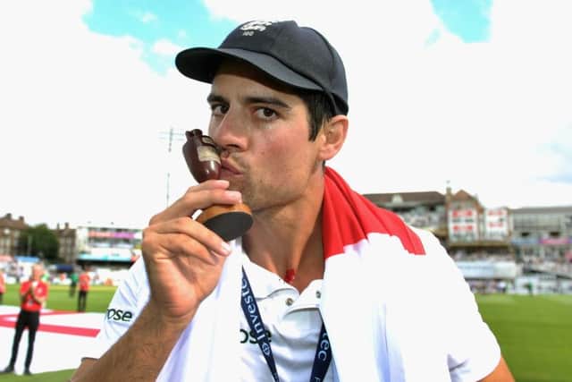Alastair Cook kises the urn as England celebrate winning the ashes. Picture: Getty