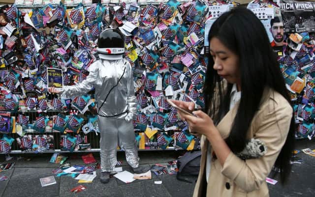 Edinburgh Fring show flyers adorn a wall on the Royal Mile. Picture: PA
