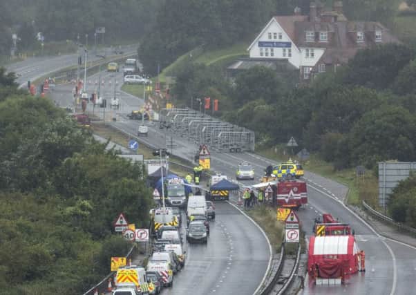 Emergency services remain at the scene of the crash where it's feared up to 20 people may have died. Picture: Getty