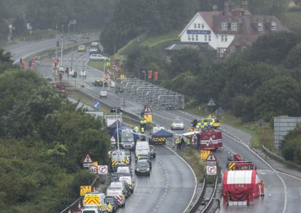 Emergency services remain at the scene of the crash where it's feared up to 20 people may have died. Picture: Getty