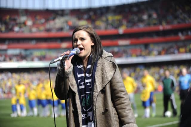 Amy Macdonald sings Flower of Scotland before Scotland's match against Brazil in London. Picture: Phil Wilkinson