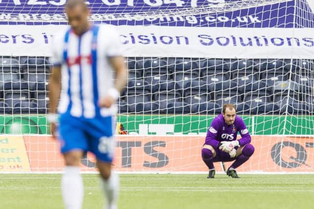 Dejection for Jamie Macdonald and Kilmarnock as they crash to a 4-0 home defeat. Picture: SNS