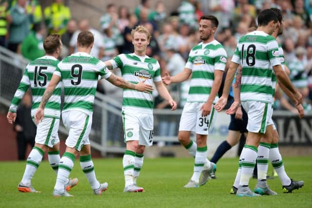 Celtic celebrate a goal against Dundee United. Picture: SNS