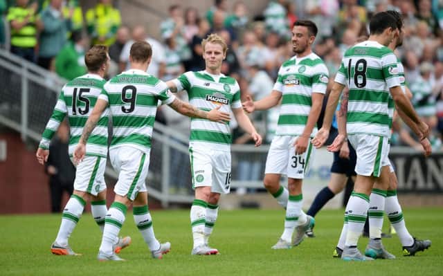 Celtic celebrate a goal against Dundee United. Picture: SNS