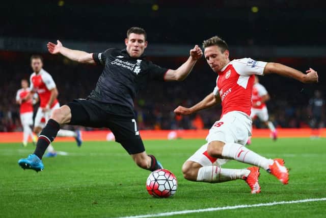 Nacho Monreal of Arsenal is closed down by James Milner during the stalemate at the Emirates. Picture: Getty