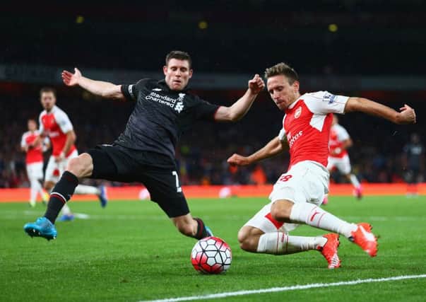 Nacho Monreal of Arsenal is closed down by James Milner during the stalemate at the Emirates. Picture: Getty