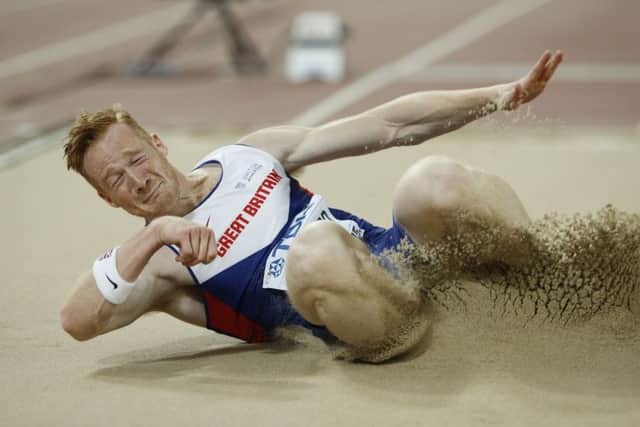 Greg Rutherford jumped 8.41m to add the world championship to his Olympic, European and Commonwealth golds. Picture: Adrian Dennis/AFP/Getty