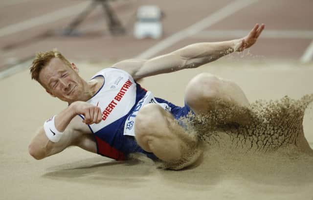 Greg Rutherford jumped 8.41m to add the world championship to his Olympic, European and Commonwealth golds. Picture: Adrian Dennis/AFP/Getty