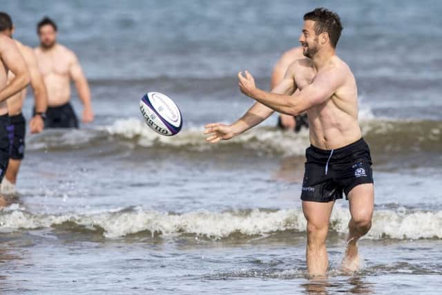 Greig Laidlaw appeared to be enjoying himself during yesterday's recovery session at St Andrews. Picture: SNS
