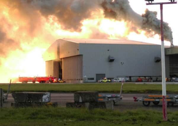 Dublin Fire Brigade battle the blaze at a hangar at Dublin Airport which has resulted in services in and out of the airport being suspended. Picture: PA