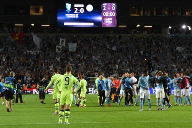 The scoreboard tells the story of a disappointing night for Celtic. Picture: SNS