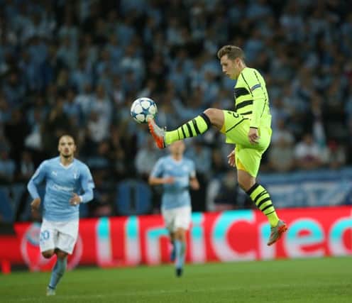 Celtic's Kris Commons controls the ball during his side's Champions League play-off second leg against Malmo. Picture: PA