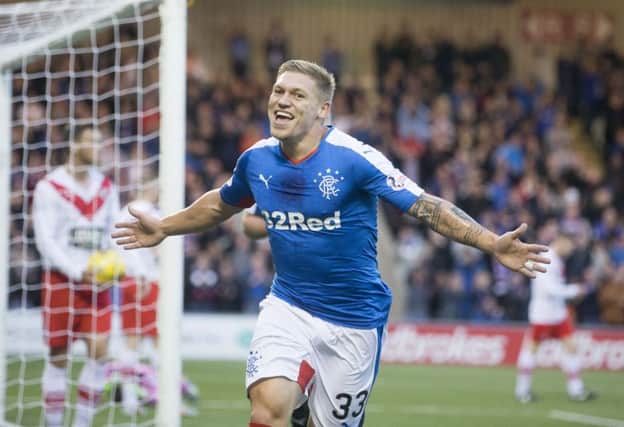 Martyn Waghorn celebrates scoring Rangers' third goal. Picture: PA