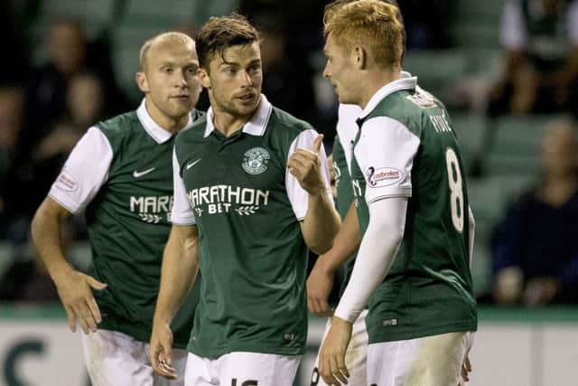 Fraser Fyvie (right) is congratulated by Lewis Stevenson after his cross is turned into the net by Scott Rumsby. Picture: SNS