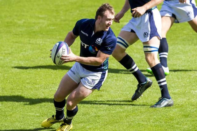 Scotland's Stuart Hogg gets on the ball at training. Picture: SNS