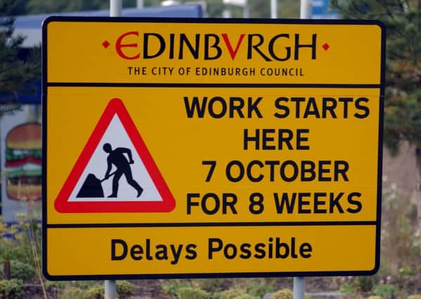 Temporary road signs can create 'dangerous' distractions. Picture: Justin Spittle