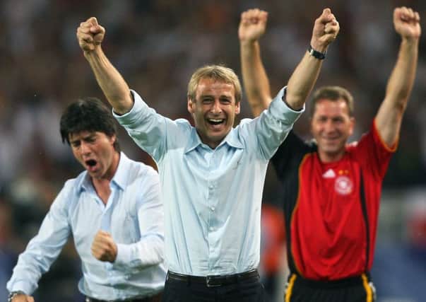 Head coach Jurgen Klinsmann, centre, celebrates a Germany goal with his then assistant, Joachim Low, left, who is now in charge of the national team.    Picture: AFP/Getty