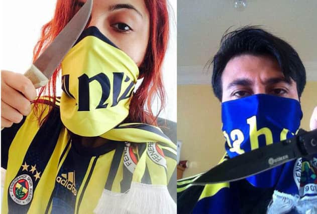 Two Fenerbahce fans pose with knives in photos on Twitter. Picture: Contributed