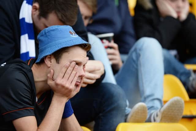 It's all too much for some Killie fans who can't bear to watch. Picture: SNS