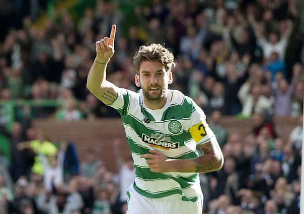 Charlie Mulgrew, on as a substitute for Scott Brown, celebrates scoring the third goal. Picture: SNS