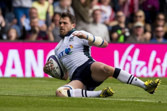 Sean Lamont crosses to score a try on his 96th Scotland appearance. Picture: PA