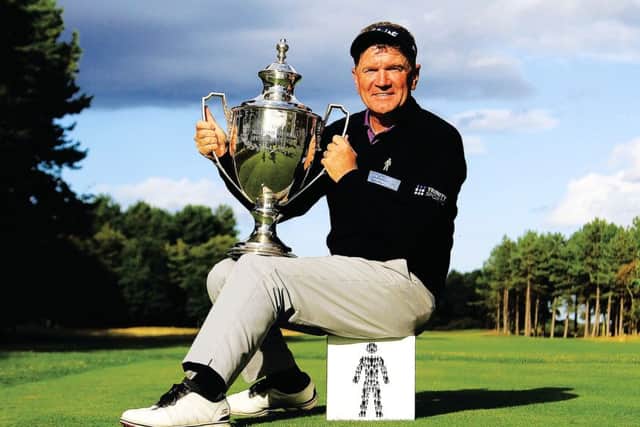 Paul Broadhurst poses with the trophy after winning the Scottish Senior Open following a play-off against Gordon Manson. Picture: Getty Images