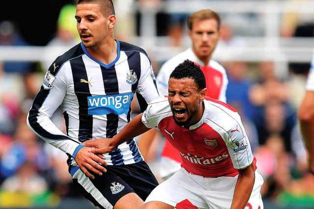 Aleksandar Mitrovic fouls Francis Coquelin  resulting in a red card. Picture: Getty