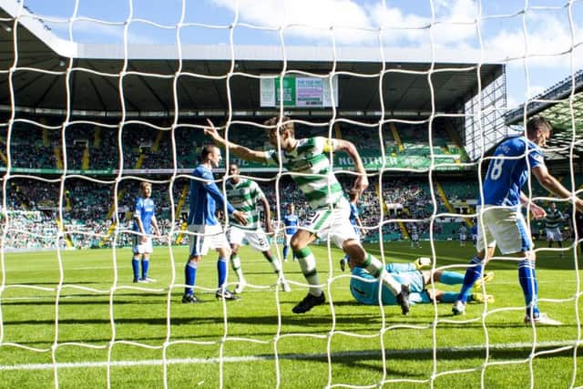 Charlie Mulgrew wheels away to celebrate his goal. Picture: SNS