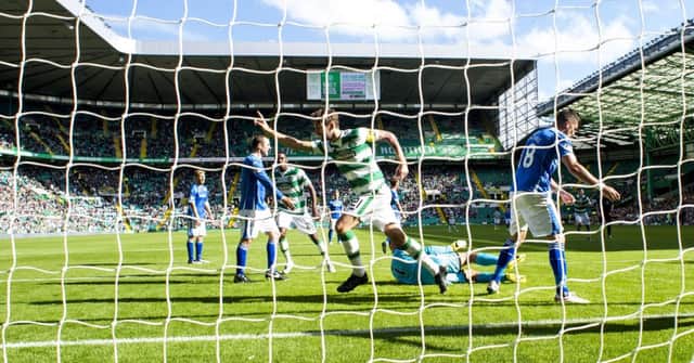 Charlie Mulgrew wheels away to celebrate his goal. Picture: SNS