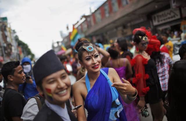Participants dance in the gay rally in Kathmandu yesterday. Picture: AP