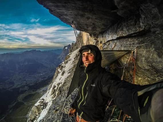 Robbie Phillips takes a sky-high selfie on the north face of the Eiger. Picture: Contributed