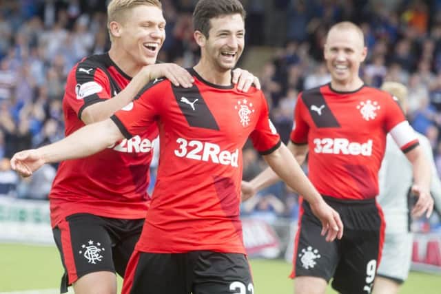 Ex-Hearts midfielder Jason Holt chipped in with the third goal. Picture: PA
