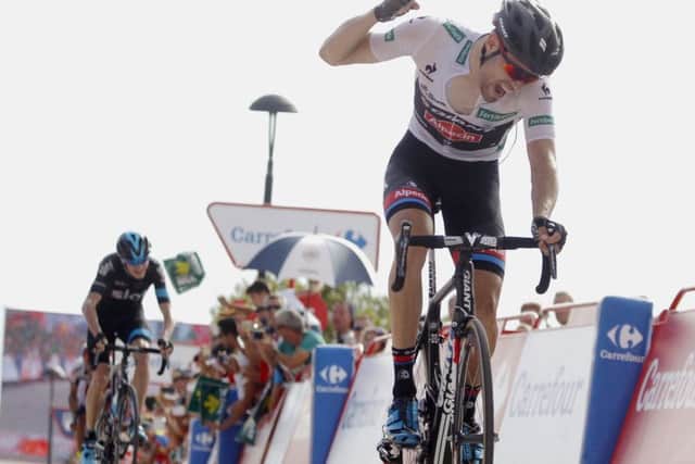 Tom Dumoulin crosses the line to win the ninth stage of the Vuelta a Espana. Picture: AFP/Getty