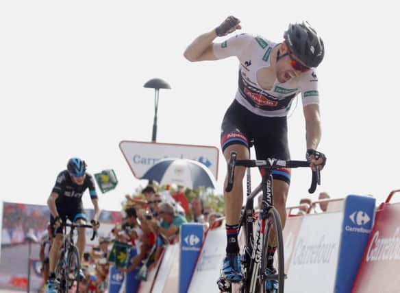 Tom Dumoulin crosses the line to win the ninth stage of the Vuelta a Espana. Picture: AFP/Getty