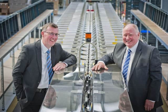 Kevin Thomson, left, of Clydesdale Bank with PM Solutions' Ron Davidson. Picture: Chris Watt