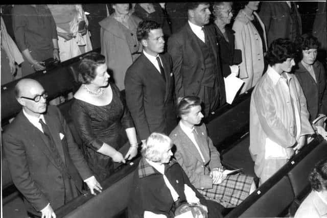 Not all Scots were keen to stand when God Save the Queen was played. Picture: TSPL
