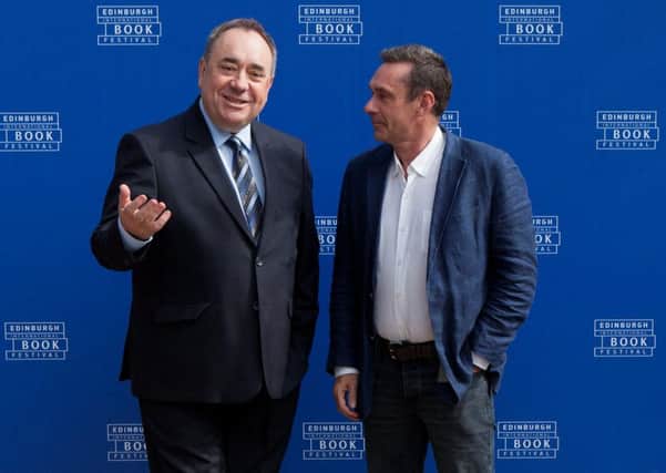 Paul Mason, Channel 4's economics editor, right, and former first minister Alex Salmond. Picture: Hemedia